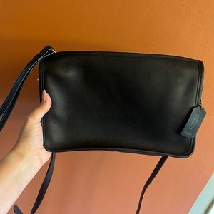 Coach skinny convertible clutch.